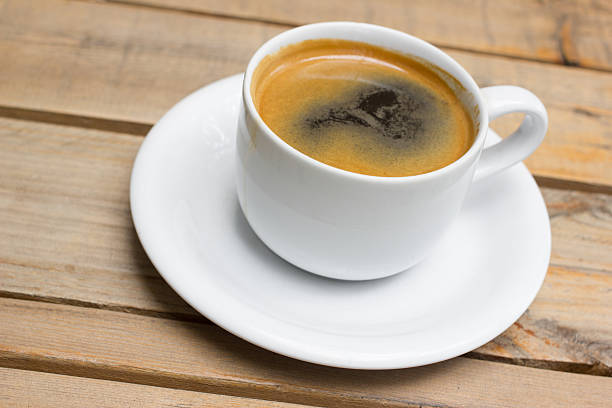 istock Cup of hot coffee , black coffee with foam. 542973080