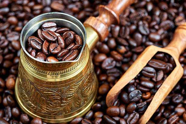 istock Coffee beans in a turkish coffee pot 543043602