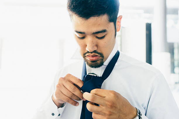 istock Young Businessman Tying His Tie 543044146