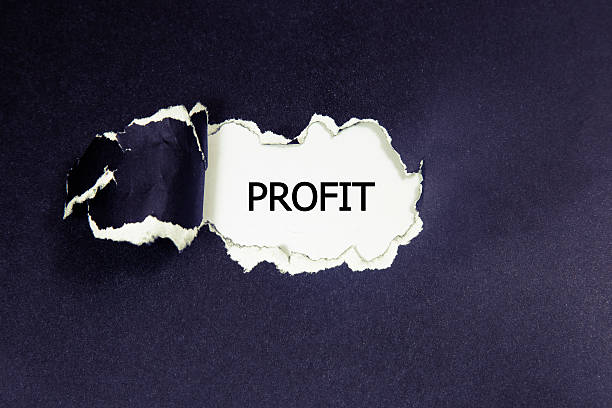istock Profit word written under torn paper. 543049228
