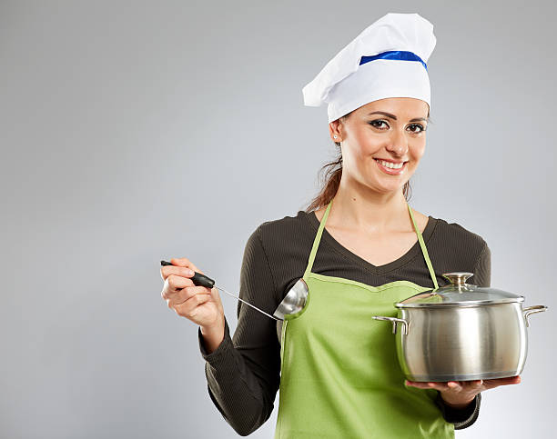 istock Woman cook with a pot 543049304