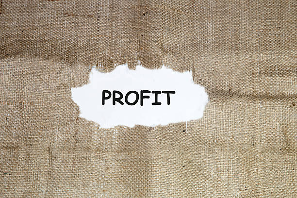 istock Profit word written under torn paper. 543050936