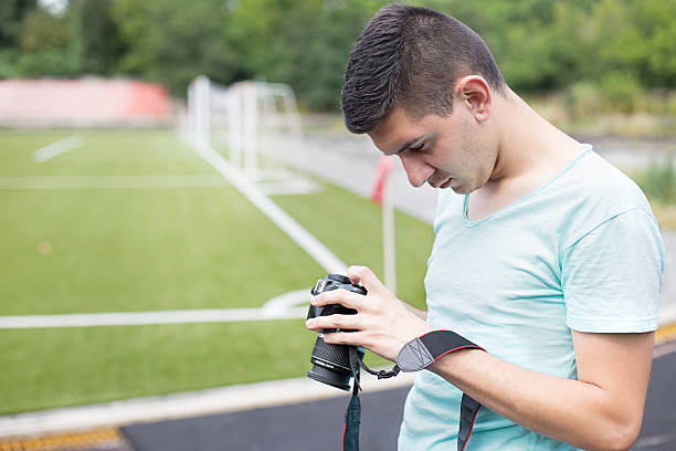 istock Young male photographer 543051224