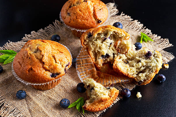 istock Homemade Blueberry Muffins with fresh berries and mint 543051280