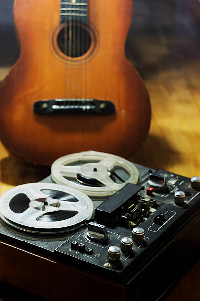 istock Old player and an old guitar 543051586
