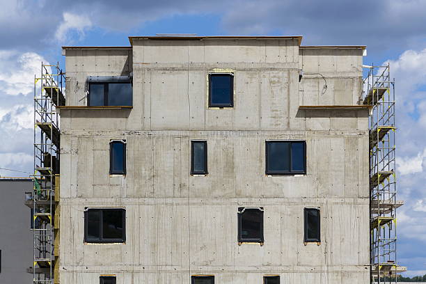istock Horizontal photo of house apartment construction site with scaffolding 543051636
