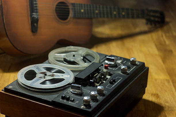 istock Old player and an old guitar 543052058