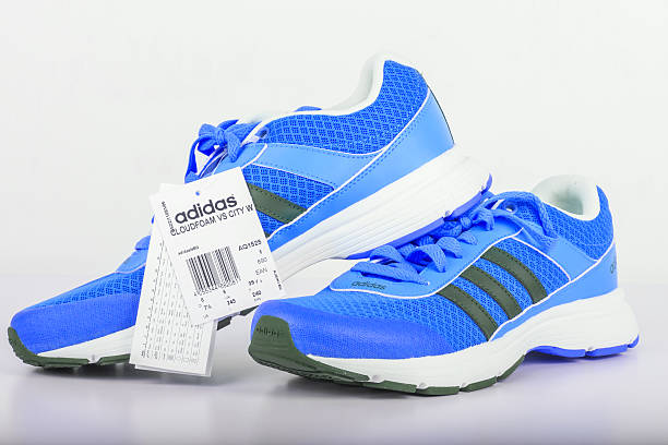 emotioneel Waardig In zicht Adidas Blue Shoes For Women Stock Photo - Download Image Now - Adidas, Shoe,  White Color - iStock