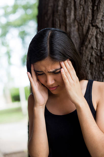 istock Young hispanic woman in pain 543054424