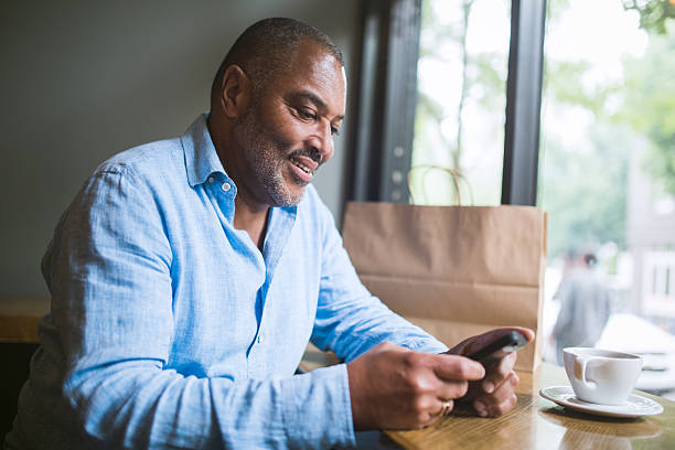 istock Mature Man on Smart Phone 543058198