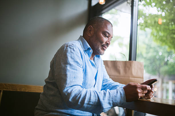 istock Mature Man on Smart Phone 543058466