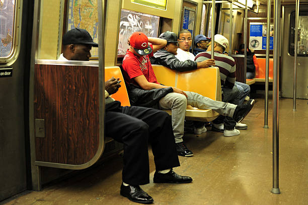 New York, New York, United States - October 12, 2009: People travel by the New York subway  in Manhattan New York, USA. It's the seventh busiest rapid transit rail system in the world