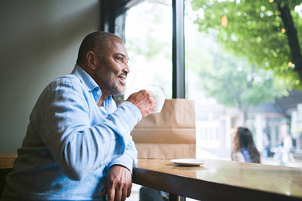 Mature Man in Coffee Shop