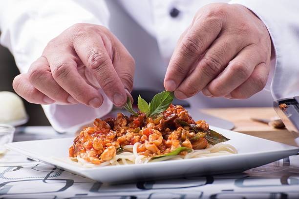 istock Chef decorated spaghetti chiken sauce 543061498
