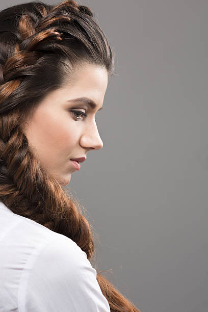 istock Woman with modern hairstyle in studio 543062536