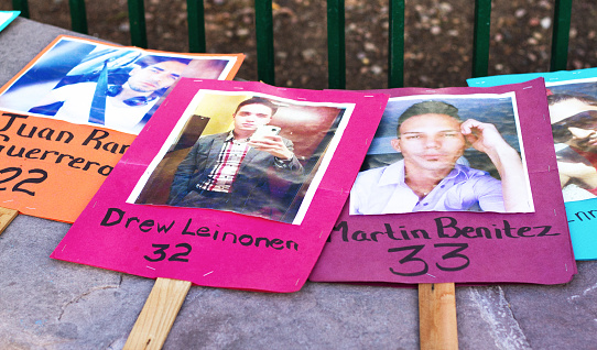 Santa Fe, USA - June 26, 2016: Posters memorializing some of the victims of the Orlando Nightclub Massacre, left as a tribute on the Santa Fe Plaza after the Gay Pride celebrations on June 25, 2016.