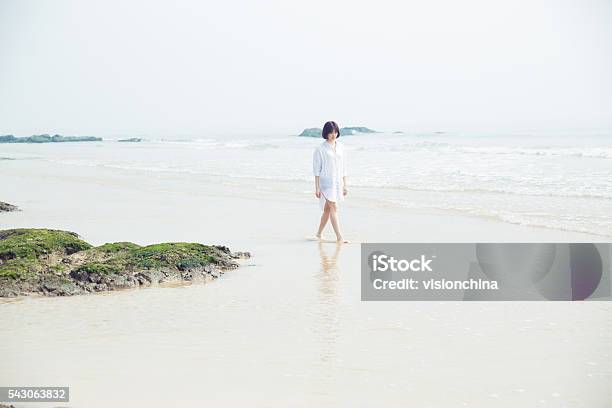 Girl Stand Beside The Ocean Stock Photo - Download Image Now - 20-29 Years, Adult, Algae