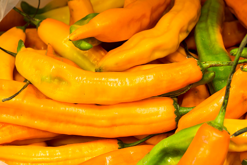 Aji amarillo, yellow chili pepper from South America, Arequipa, Peru.  Natural market look.