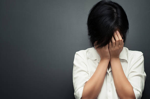 Sad asian woman