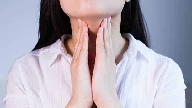 istock women sore throat 543066056