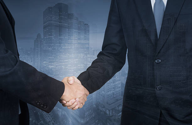 istock business concept,Double exposure of handshake hand 543066790