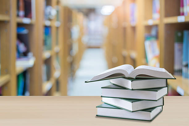 istock open book on library room,education concept and background 543066998