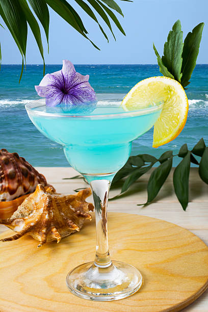 istock Blue Hawaiian cocktail on the tropical beach 543067286