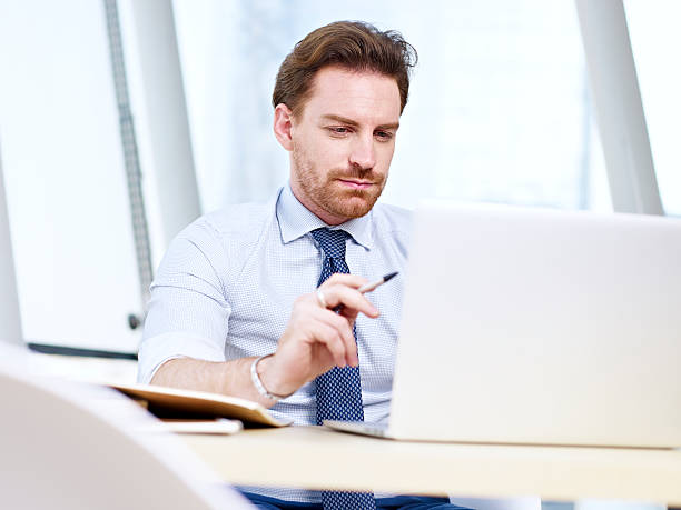 istock business person working in office 543067428