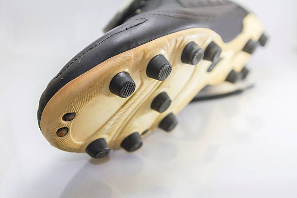 Selective focus to button of soccer shoes / Football shoes