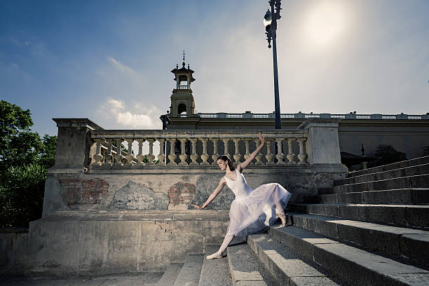 Ballet dancer jumping in the city