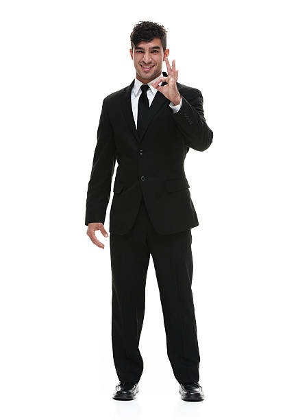 istock Smiling businessman giving ok sign 543073732