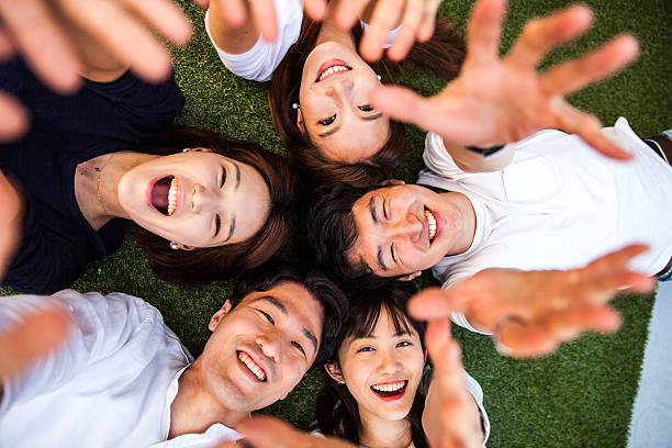 istock People having fun, taking a Selfie all together at party 543077384