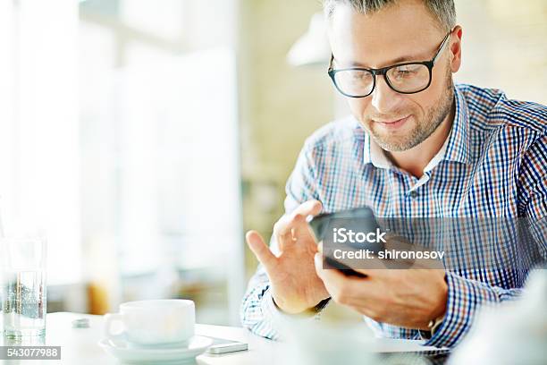 Writing Sms Stock Photo - Download Image Now - Mobile Phone, Text Messaging, Businessman