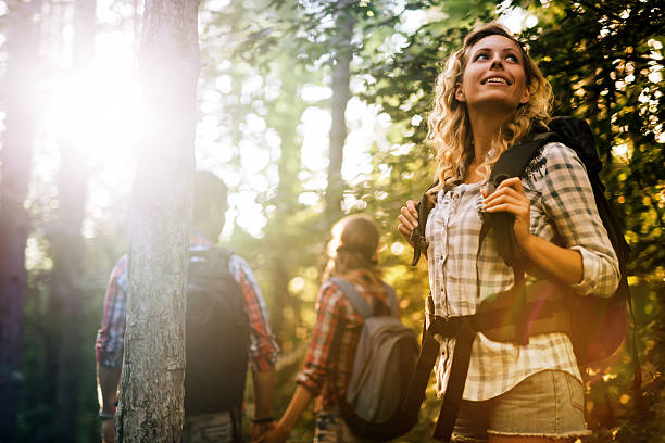 istock Group of people hiking in forest 543078156