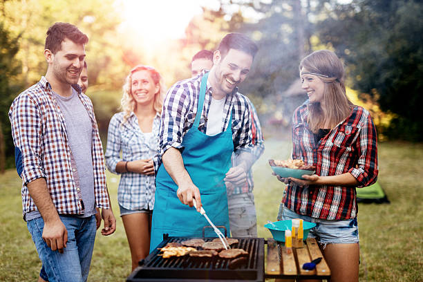 istock Friends camping and having a barbecue 543078756