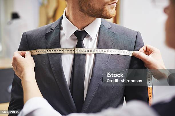 Measuring Front Of Jacket Stock Photo - Download Image Now - Tailor, Suit, Men