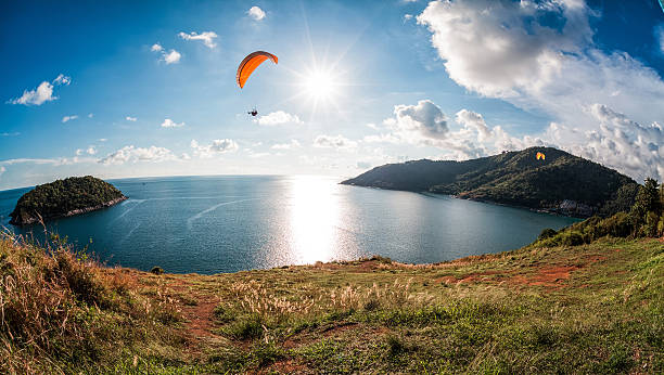 istock Skydiver flying over the water 543082320