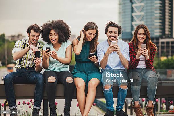 Connecting And Sharing Stock Photo - Download Image Now - Friendship, Group Of People, Telephone