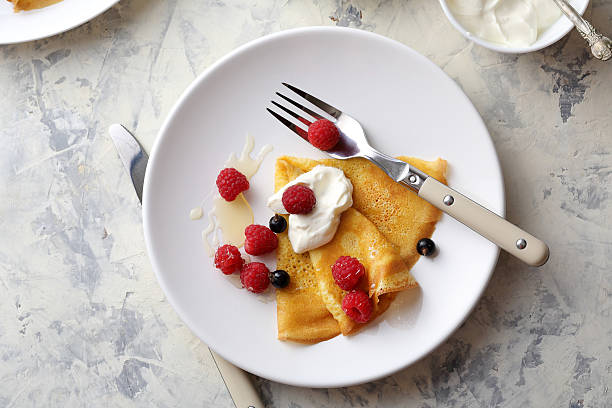 istock golden crepe with raspberry and cream 543082992