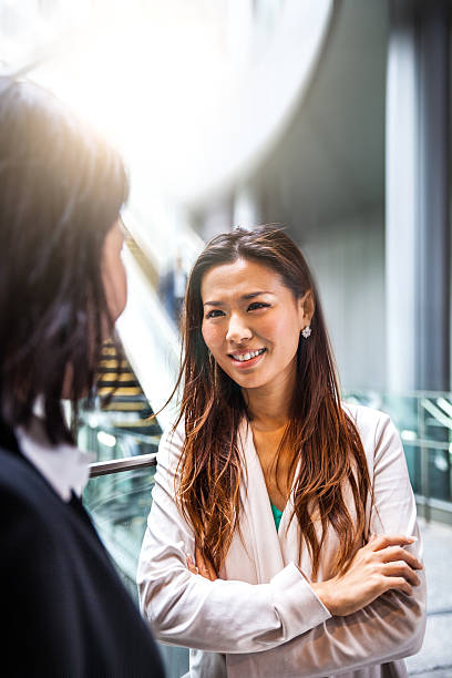 istock Japanese business women in downtown Tokyo 543086310