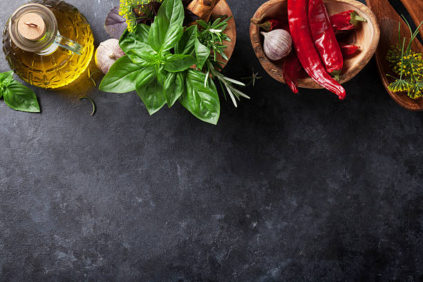 istock Garden herbs in mortar, oil and chili 543087974