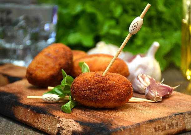 plate full of home-made croquettes of ham stock photo