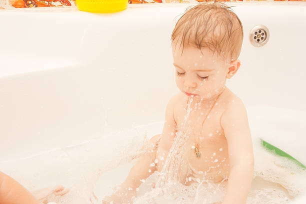 istock small child bathes in a bathroom 543173920