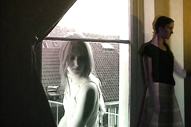 istock Small and big women in front of a window. 543176620