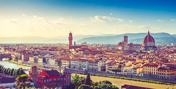 Evening sunset landscape view to florence Evening sunset landscape view to ancient town florence arno river tuscany italy cathedral santa maria del fiore palazzo vecchio tower replica santa maria ship stock pictures, royalty-free photos & images