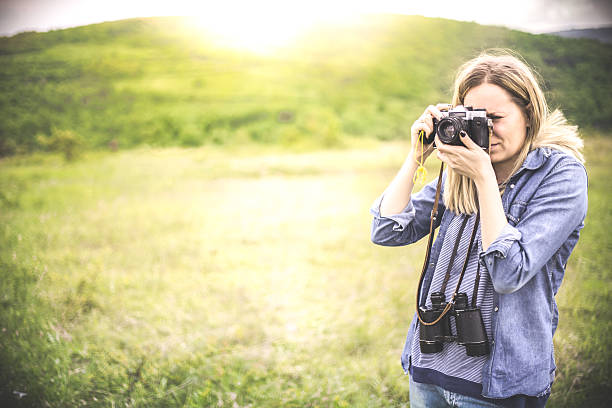 istock Hipster female photographer exploring nature 543178870