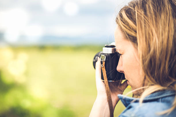 istock Hipster female photographer exploring nature 543178922