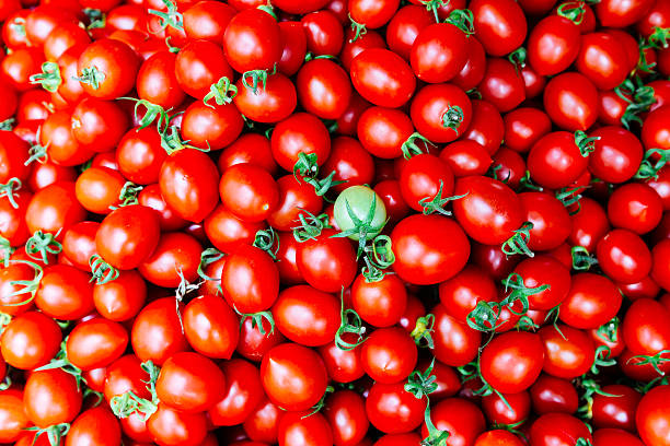 istock Heap of red tomatoes background. Flat lay view. 543179450