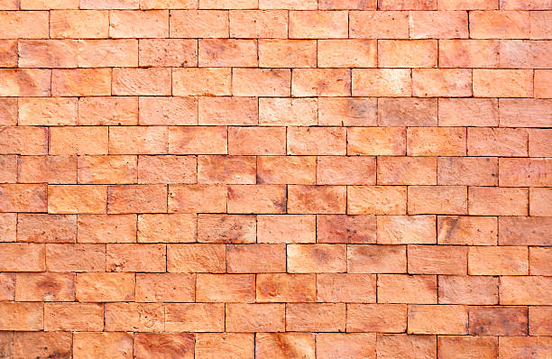 istock Background texture of the new red brick wall. 543180348