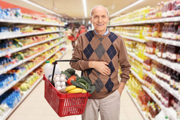 istock Senior shopping and posing in a supermarket 543180954
